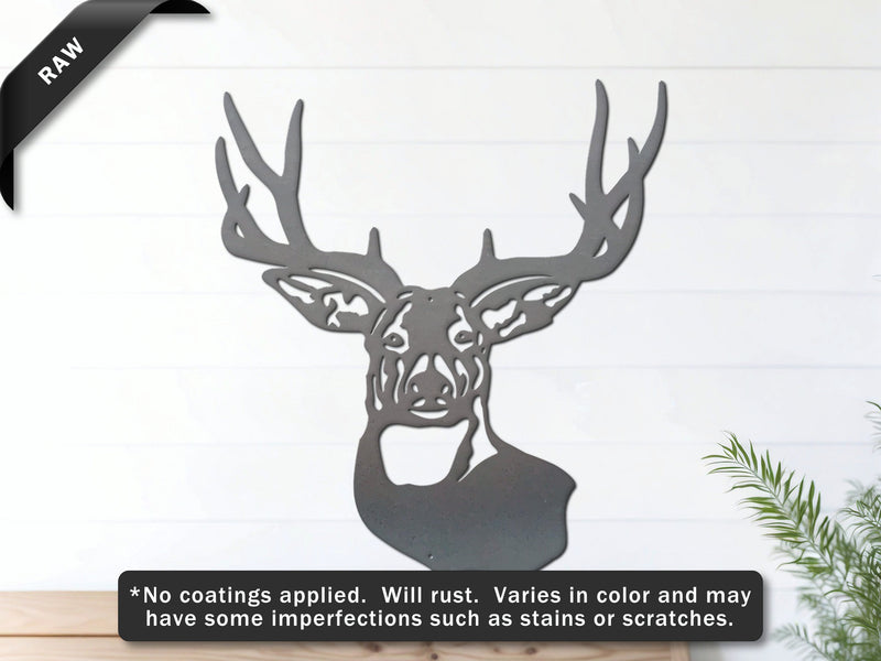 A deer head metal wall art in raw steel color hangs on a white wall above a wooden bench