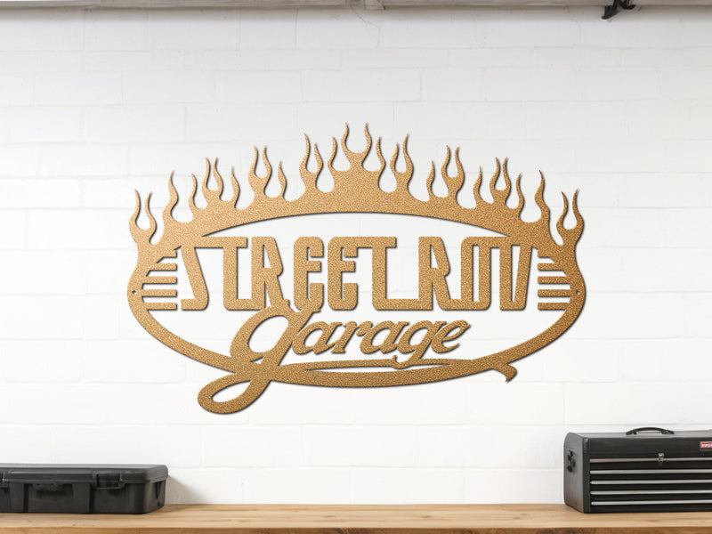 Gold powder coated garage wall sign reading Street Rod Garage with flames