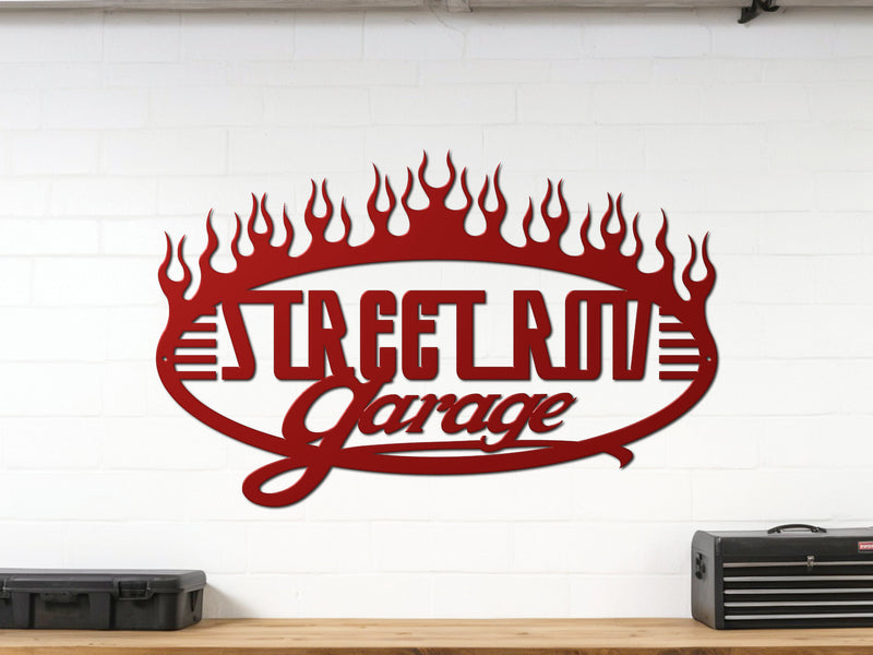 Red powder coated garage wall sign reading Street Rod Garage with flames